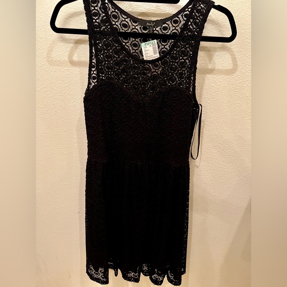 Black cocktail dress with lace covering. NWT. Juniors sizing large. From Papaya